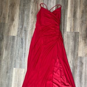 Red maxi ball gown with high slit